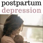 young mother with postpartum depression holding baby