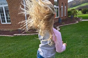 little girl in the wind