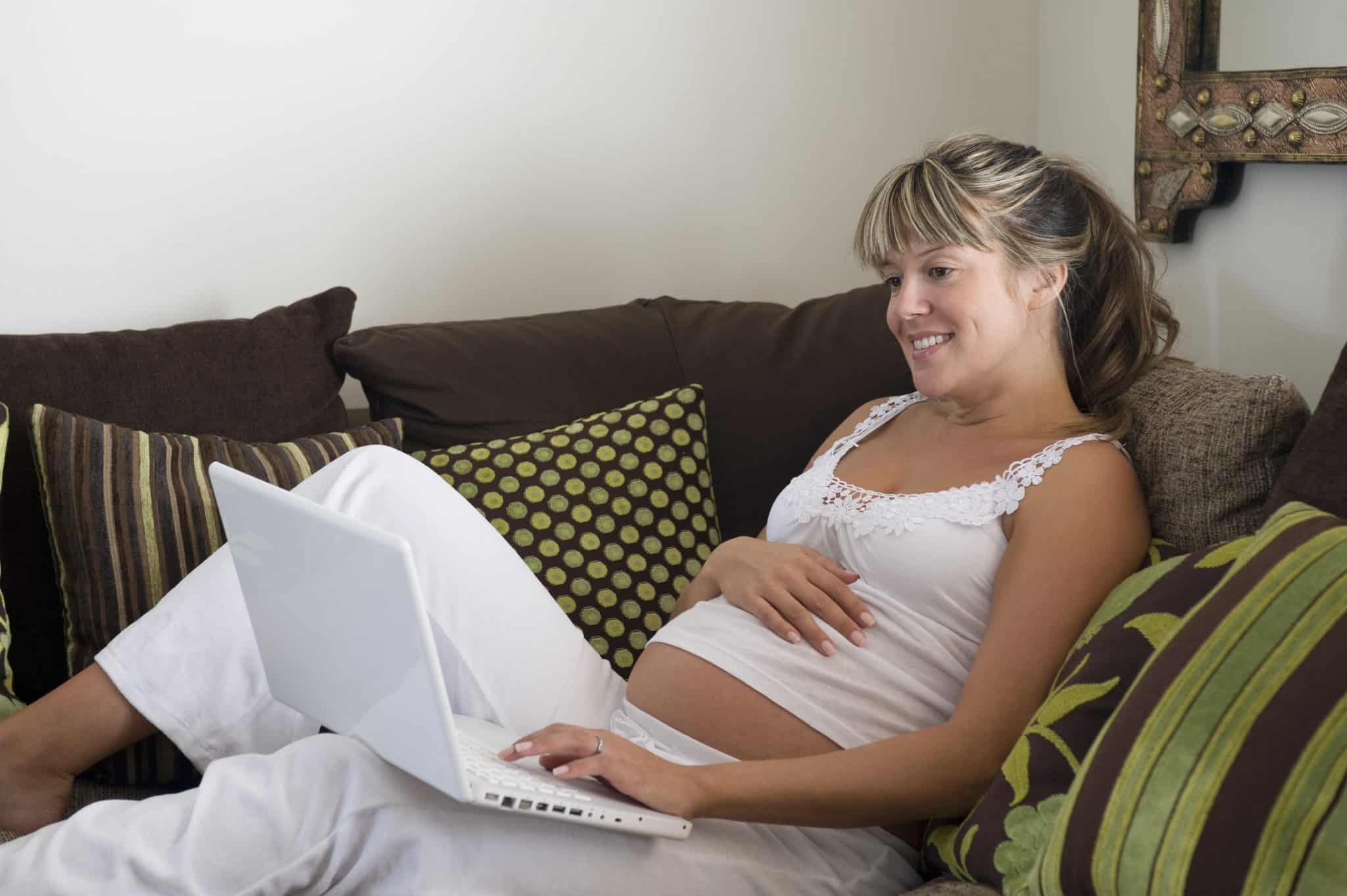 pregnant woman on laptop