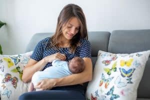 mother-breastfeeding-newborn-with-nursing-cami-1