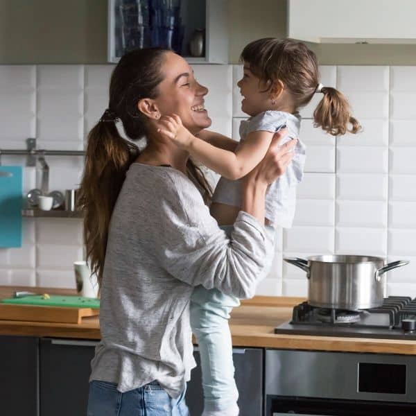 mom and girl in kitchen