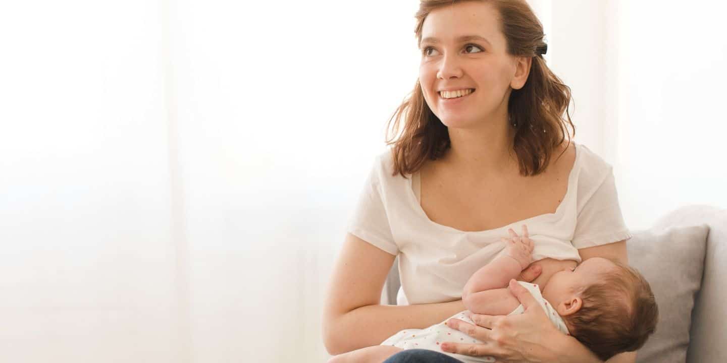 happy breastfeeding woman