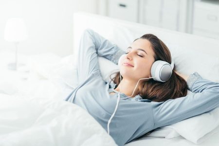 woman relaxing with headphones