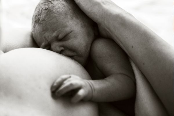 brand new baby breastfeeding