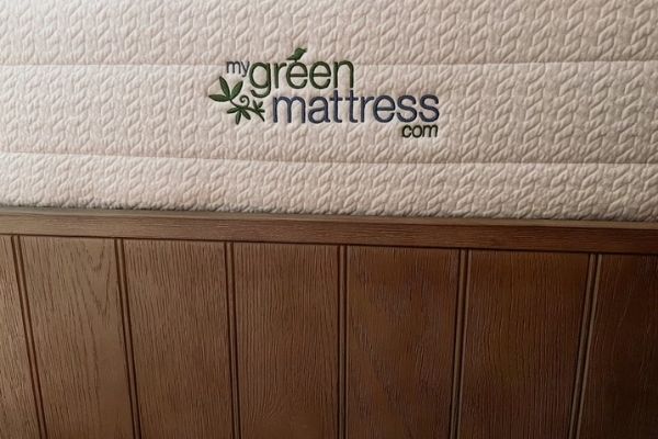 Side of kiwi mattress with My Green Mattress logo on it