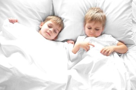 Little boys sleeping on Avocado Eco Organic mattress