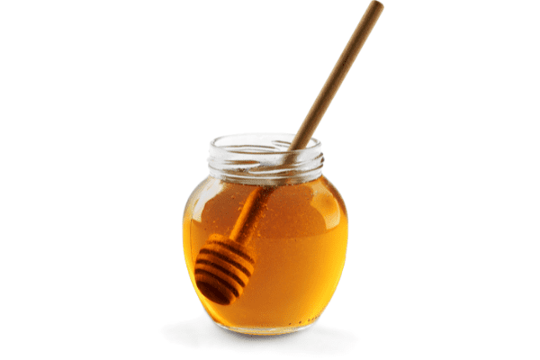 Jar of honey with spoon.